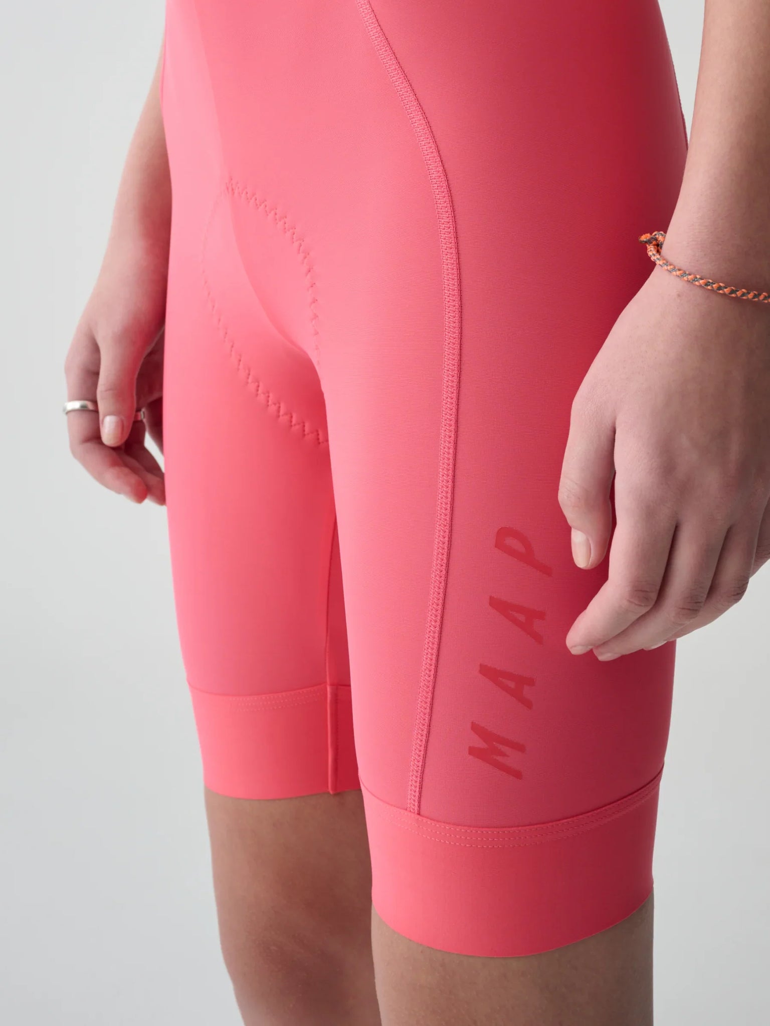 WOMEN´S SHORT TEAM BIB EVO - VIVID PINK